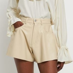 SALE🎄WeWoreWhat Flare Bell Vegan Leather short